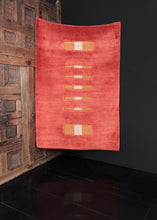 Contemporary Gabbeh rug handwoven in South Iran. Combination of pile and kilim elements in large blocks of color. Overall red field with stripes of saffron in the middle. 