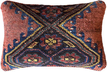 Pillow crafted from fragments of handwoven antique Kurdish rug