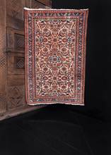 Malayer rug handwoven first quarter of 20th century in Western Iran. Classic herati design in blues and pinks on ivory ground. Main border is stars and leaves design. 
