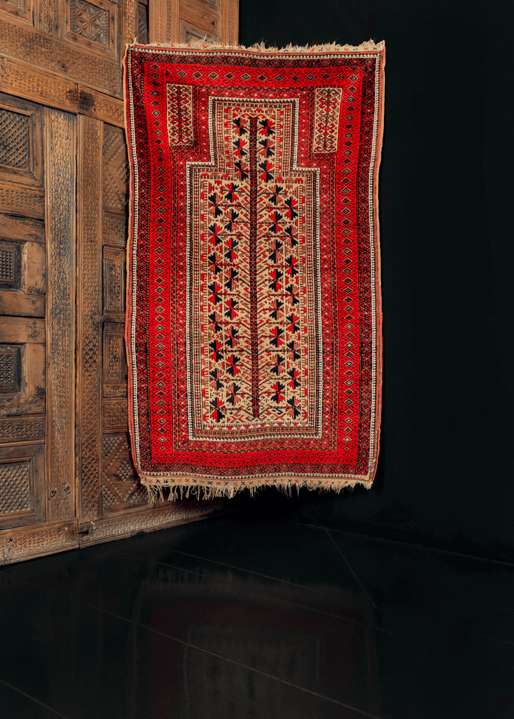 Baluch prayer rug with tree of life motif, in camel, red, black, and white. early 20th century from Afghanistan