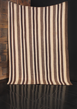 Persian kilim featuring marled stripes of brown, ivory and blue. Flecks of multicolored wool. 