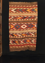 Maymana kilim handwoven during second quarter of the 20th century in Northwest Afghanistan. Striped geometric design in warm red, brown, yellow and blue. 
