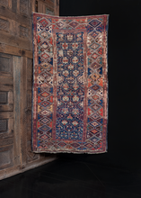 Antique shirvan rug with lattice design and geometric blossoms. Worn but in solid condition
