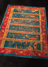 chinese deco rug with six screens with floral designs on a cobalt blue and magenta ground