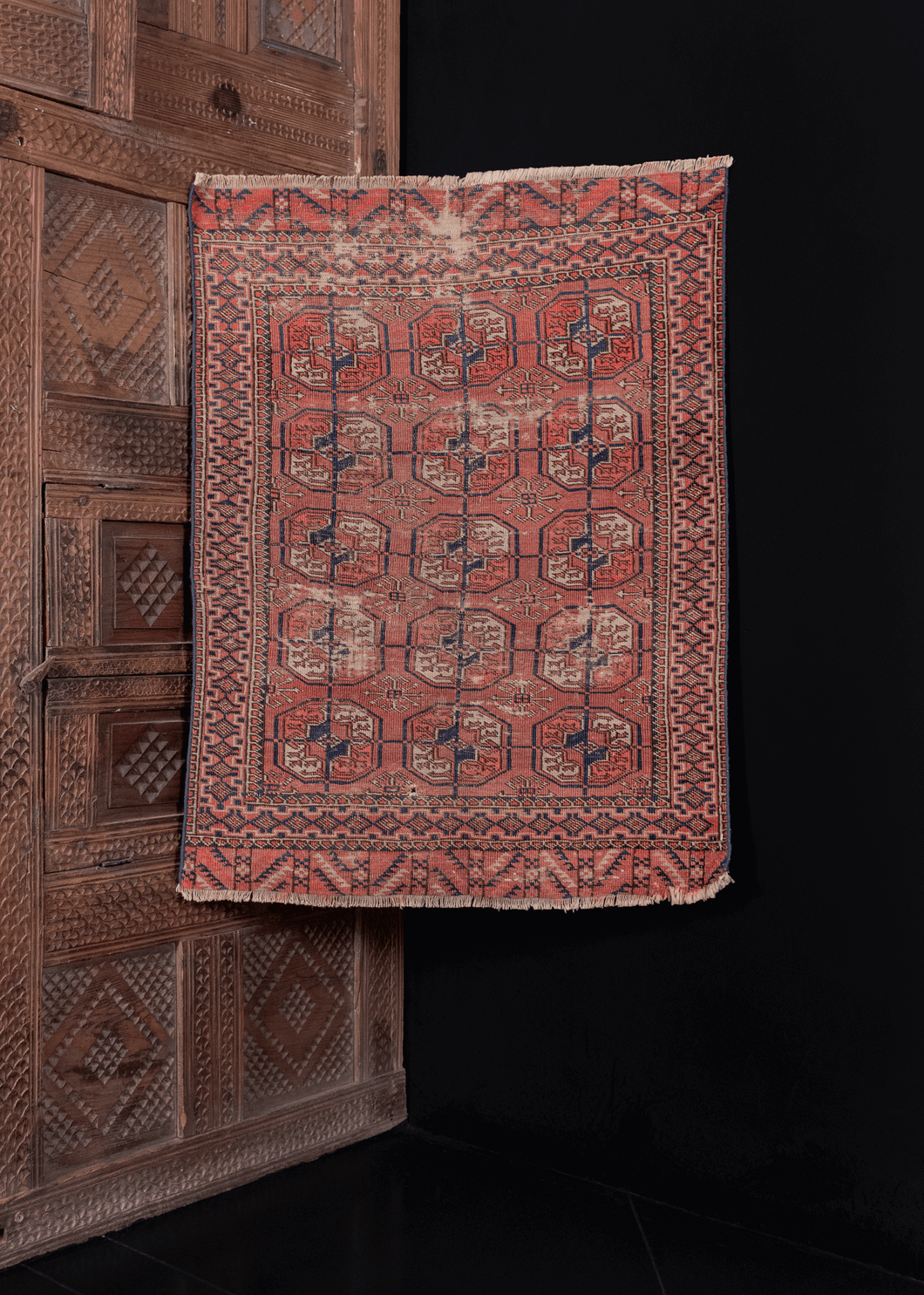 small Turkmen rug with allover gul design in red blue and ivory colorway