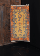 Vintage yellow & orange Chinese Gansu rug with gentle soft handle.
