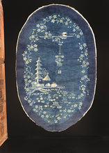 Chinese Peking rug handwoven during first quarter of 20th century. Pictorial scene with pagoda upon a pond of lotus flowers. Night scene with the moon and clouds behind lantern hanging on a cherry blossom branch. 
