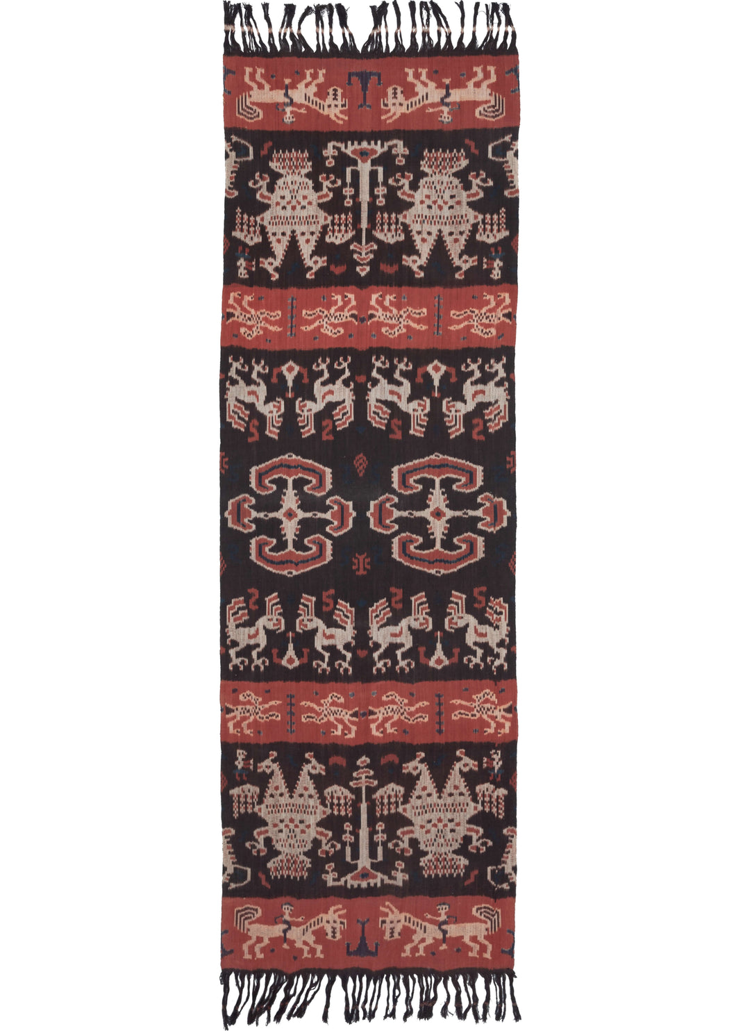 The design of this East Sumbanese Hinggi Kombu ikat textile is a mirror image of itself, which can be read in both directions and from side to side. The central geometric motif is named habak, a common centre motif for ikats, and was once a symbol of royalty. The other figures are animals like horses and cockatoos, both commonly found animals in Sumbanese weaving.  