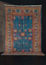 Mid Century bright blue wool NW Chinese Khotan rug