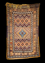 Mid Century Moroccan Ouaouz Area Rug with prominent tumeric color and diamond motifs, excellent patina