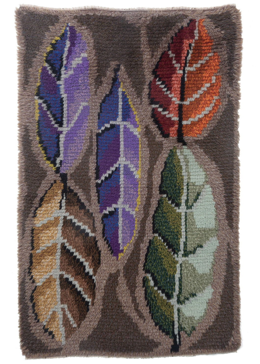 Mid Century handwoven Swedish rya ryya rug which has the handle of a blanket and the design of 5 colorful leaves on a taupe field