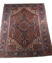 NW Persian Central Medallion Room Sized Heriz rug featuring deep colors of madder brown and subtle indigo blue and even grey