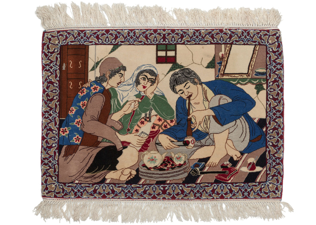 Persian Isfahan small scatter rug depicting two men and a woman sitting on a simple striped rug, smoking opium. The woman stares wantonly at the smoker as her companion (the drinker) looks upon her with suspicion. An intricate curvilinear border frames the scene. In perfect condition, with no signs of wear.