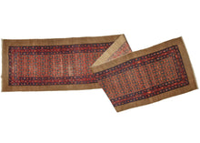 Persian Serab runner featuring an all-over ground of lively latticework in red, orange, and blue with small moments of camel poking through.  Nicely finished with an inner border of alternating boteh and rosettes on a red ground and two similarly scaled outer borders of scrolling rosettes on a blue ground. The borders are further framed by a thick perimeter of sandy-toned undyed camel wool.