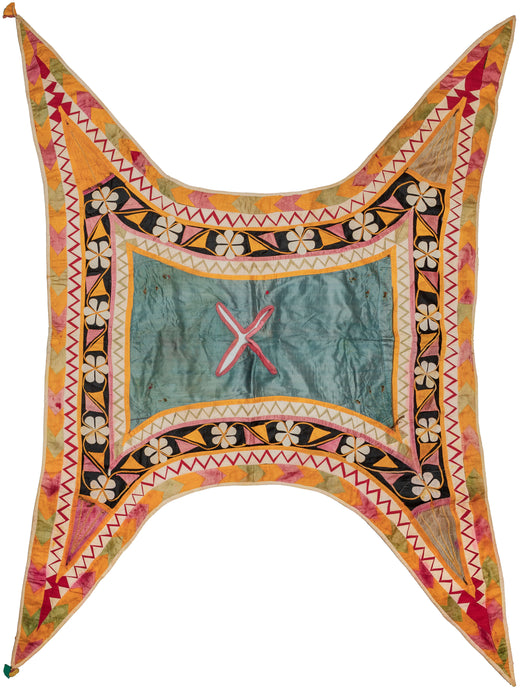 Silk Mid century Rabari camel cover featuring brightly colored applique in a very distinctive format. This format is made by the Rabari people of the Kutch region of Gujarat and specifically for a camel. In Fair condition with some wear and color run. Some of the fabric and metallic have worn down.