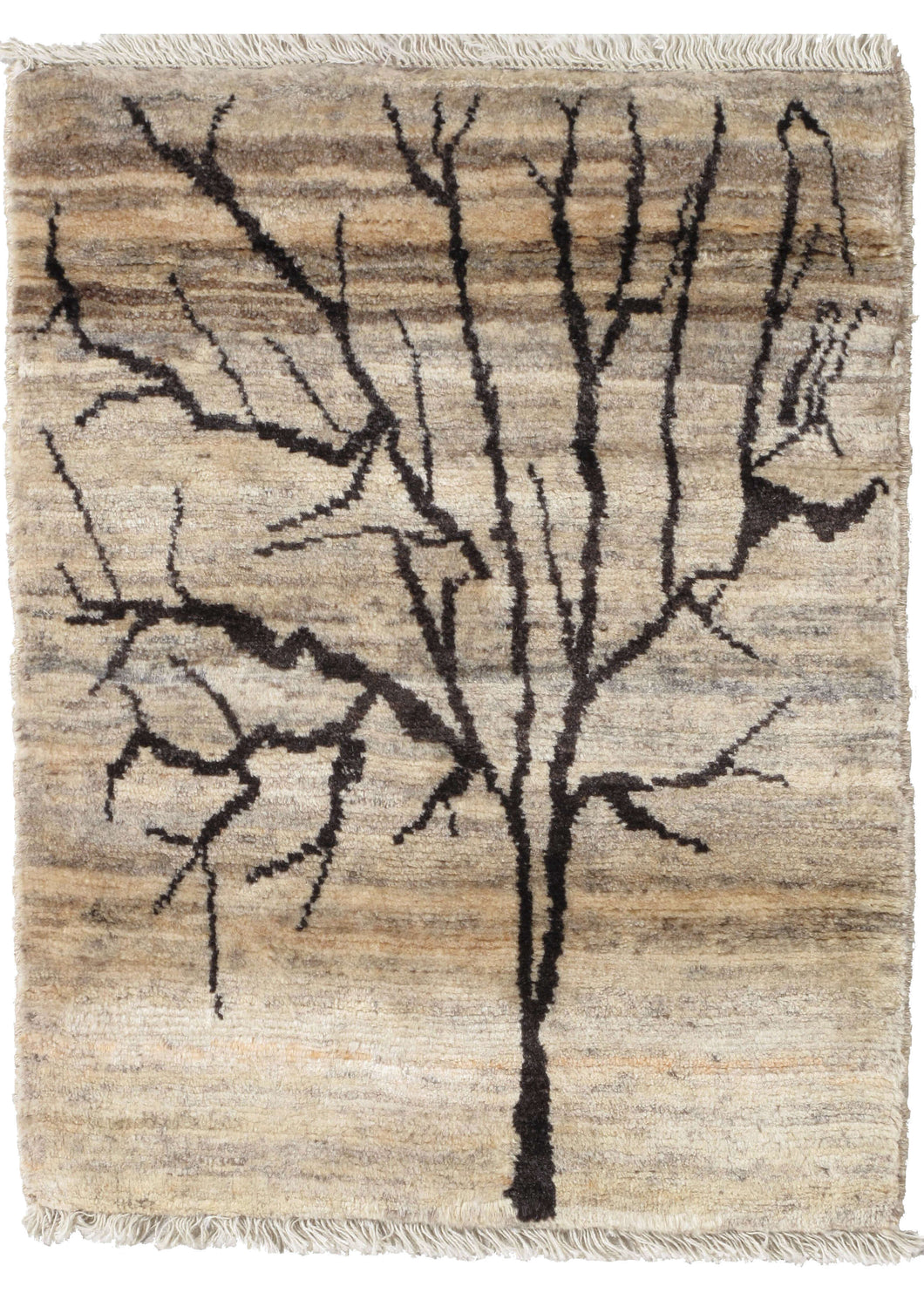 This Tree Gabbeh Rug features a simple and very organic rendering of a tree in dark brown barren of any leave on a variegated cream and brown ground.  The simple form is naturalistic in its asymmetry and in the way the branches spread out into various tributaries. The pile is densely woven, making this a plush rug. Great for the floor or the wall.