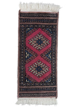 Tiny vintage Central Asian Bokhara rug