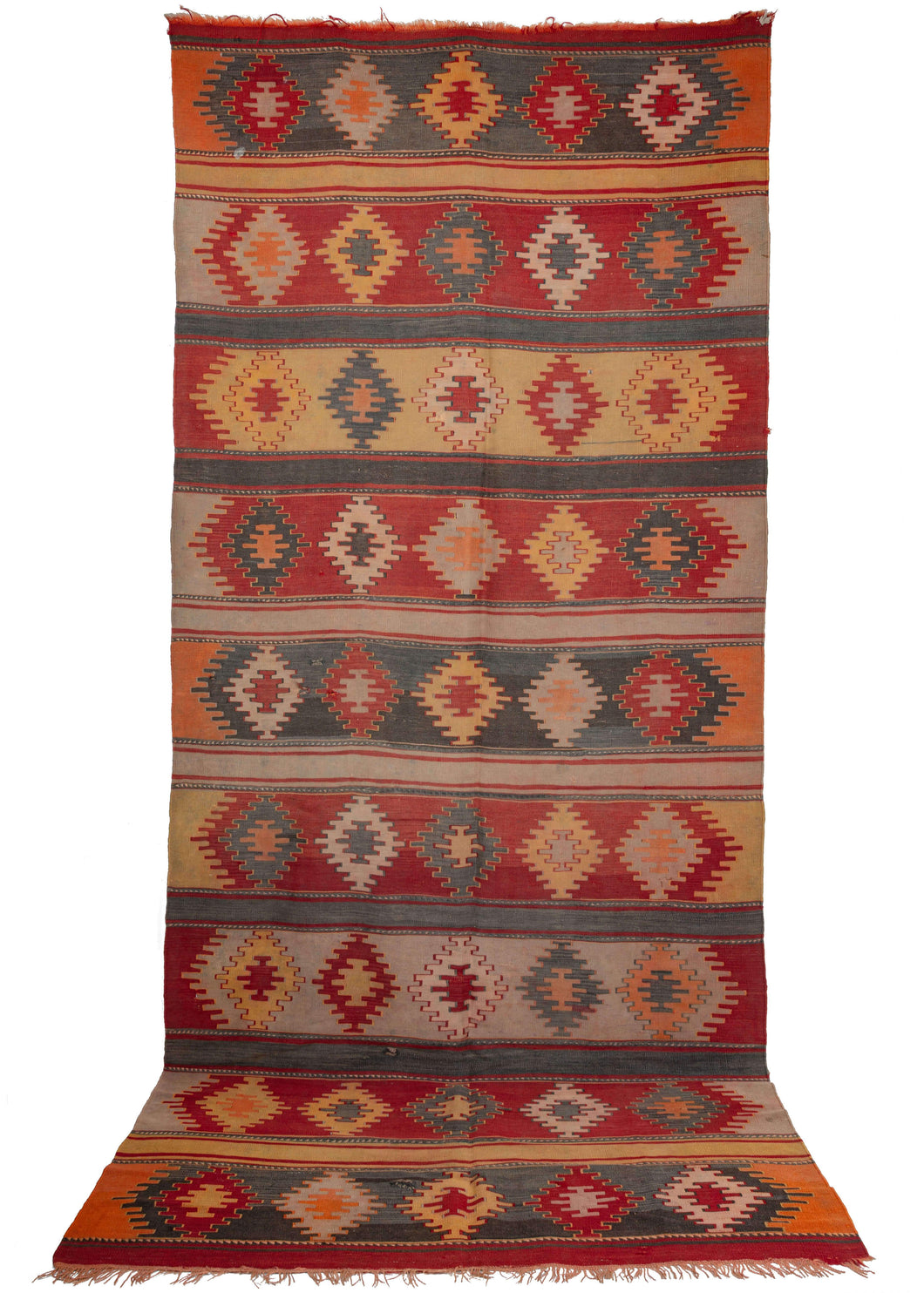 Vintage Turkish Kilim that features horizontal rows of serrated diamonds each separated by a thin unadorned band. An uncommon combination of red, yellow, gray, charcoal and orange give it an interesting and distinctive feel. 