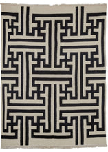 Vintage AELFIE kiilm featurinnng an experimental design which was produced in very limited quantites. The design is of abstracted red "Kufic" script on a white background. The simple yet elegant design has a maze like quality and can be alternatively read with the red as the background tone.