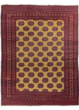Vintage golden red Bokhara carpet featuring a classic Bokhara design of diagonally repeating güls in reds, oranges, and browns on a golden yellow field. 
