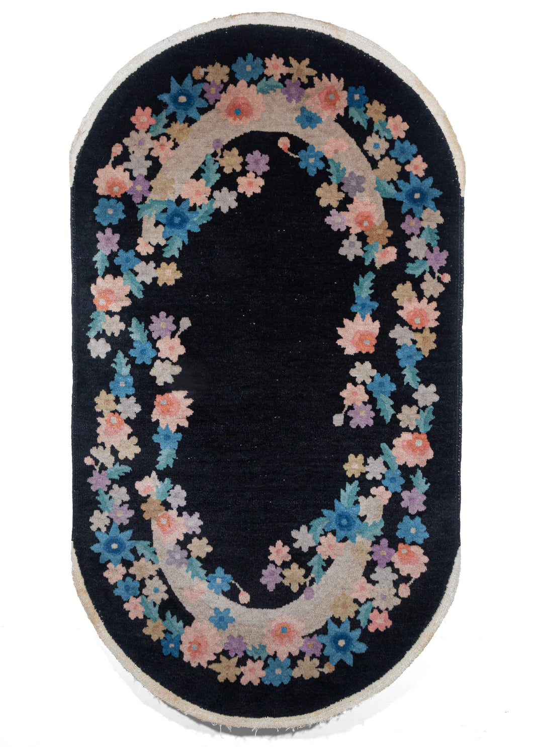 Vintage Black Oval Chinese Art Deco Rug with a open border of pastel flowers