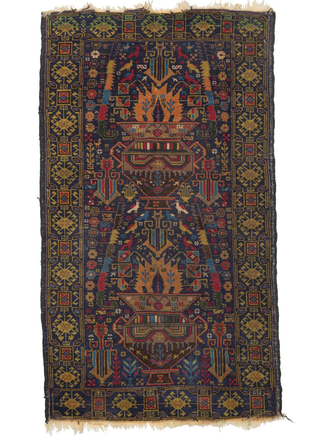 This Vintage Baluch Rug features multiple vases that almost appear to be filled with flames atop a navy ground. The vases are flanked by geometric flowers and stacked polychrome serrated leaves with the remaining space chock full of various rosettes, birds, vegetation, and botehs.
