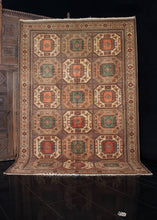 Turkish Sivas rug handwoven during the third quarter of the 20th century.   This rug features an allover medallion design, with an earth toned color palette composed of reds, greens, and a variety of browns.  In perfect condition, signs of wear consistent with age. Low pile, with a dense handle.