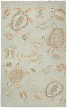 This Gabbeh rug was woven in Southern Iran during the end of the 20th century.   This rug features a variety of sea turtles in multiple colors and sizes against a undulating sage background. A calming and playful rug which is open and borderless. A modern interpretation of the classic gabbeh animal rug in a desirable room size.