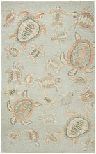 This Gabbeh rug was woven in Southern Iran during the end of the 20th century.   This rug features a variety of sea turtles in multiple colors and sizes against a undulating sage background. A calming and playful rug which is open and borderless. A modern interpretation of the classic gabbeh animal rug in a desirable room size.