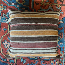 Pillow crafted from fragments of a Turkish wool kilim.