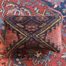 Pillow crafted from fragments of handwoven antique Kurdish rug from Northwest Iran.
