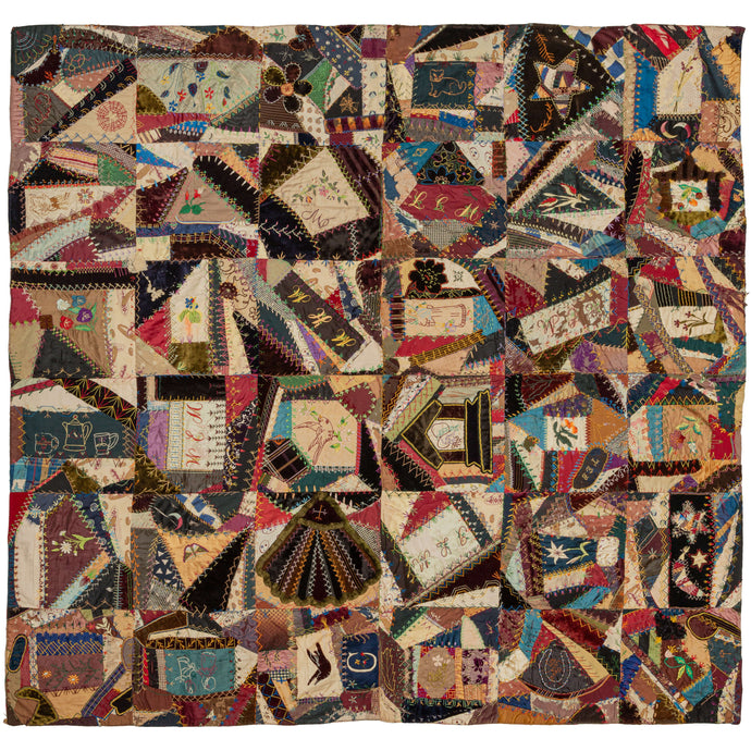 This particular quilt was composed during the height of this movement and epitomizes the Victorian design sense. It features an incredible amount of symbols, detailed needlework, and a variety of fabrics giving it a powerful graphic impact. The symbols range from cats, crescent moons, teas sets, fans, butterflies, flowers, and even a beaded horseshoe with 
